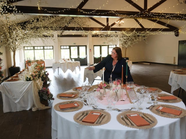 Lynsey Fryer tending to the tables. photo: Richard Ponter