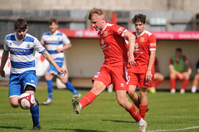 New Brid Town signing Max Ezard in action against Driffield.