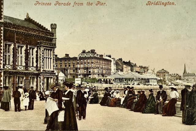 Shown in c.1908, the Victoria Rooms are clearly visible beside a busy looking North Pier.