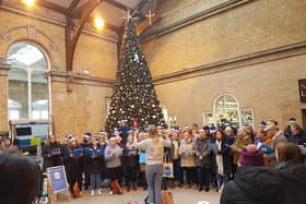 Lucy's pop choir at the Christmas Sing for SASH