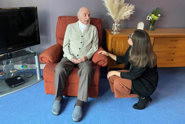 Lucy Tymon with a patient.