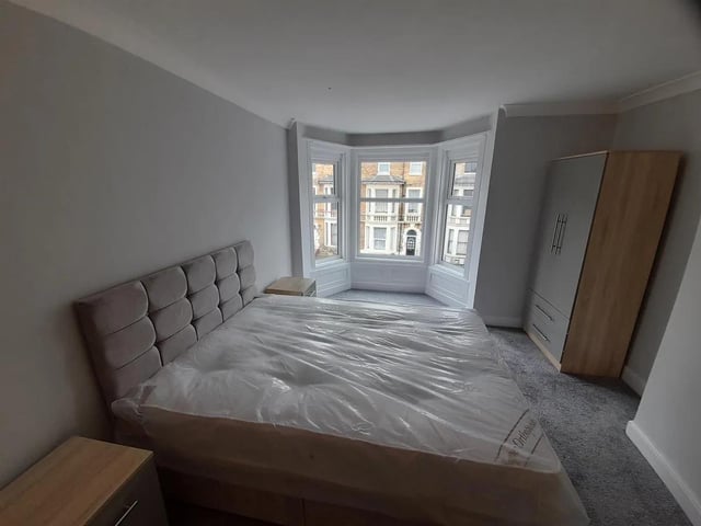 The main double bedroom has bay windows, with recently installed double-glazed UPVC units.