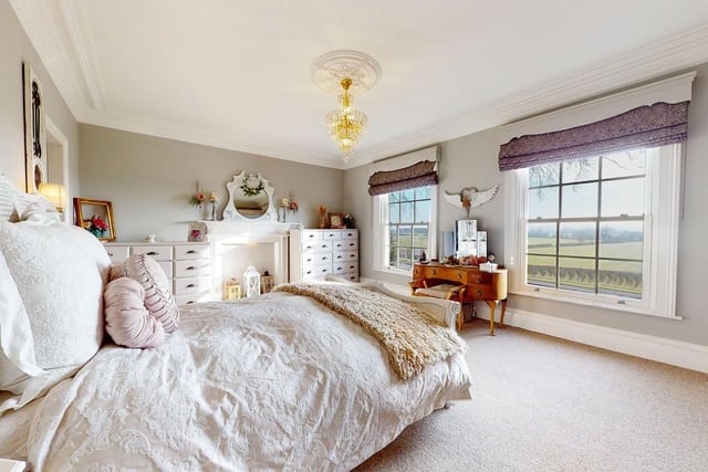 A double bedroom with open views within the property.