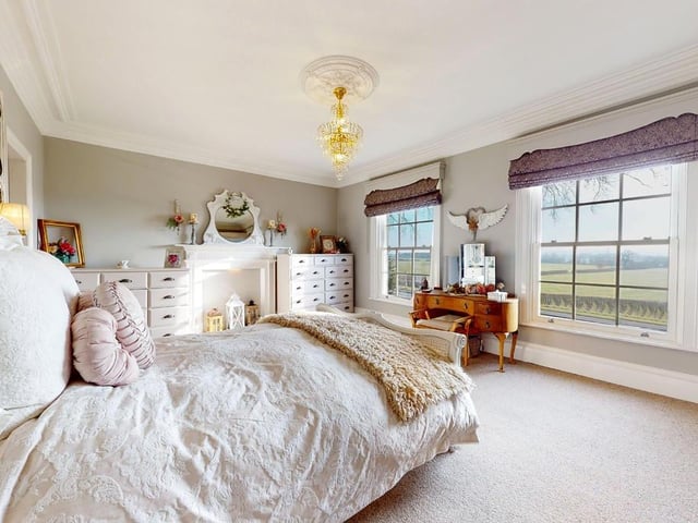 A double bedroom with open views within the property.