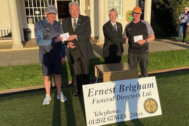 The prizes were presented by representatives of sponsors Ernest Brigham to winner Andy Deighton, left, and runner-up Paul Morgan at Brid Bay.