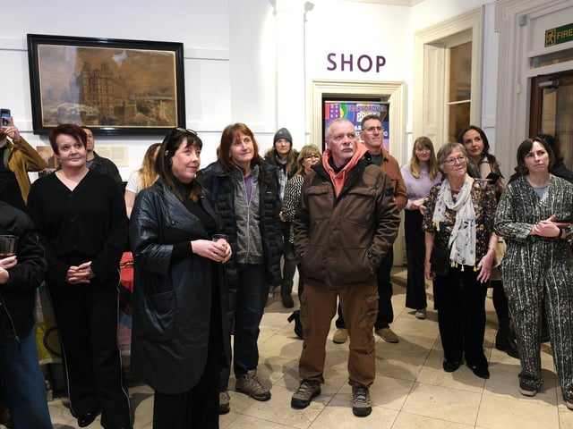Guests gather at the exhibition