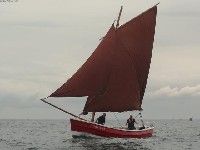 Free Spirit with a reef in and sailing well.