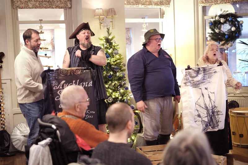 Auckland Singers perform a shanty at Hotel Victoria. picture: Richard Ponter