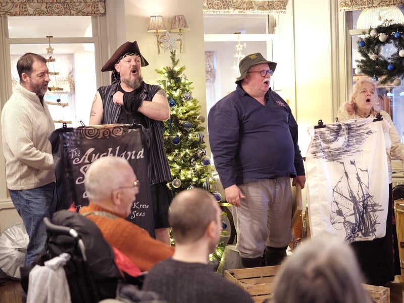 Auckland Singers perform a shanty at Hotel Victoria. picture: Richard Ponter