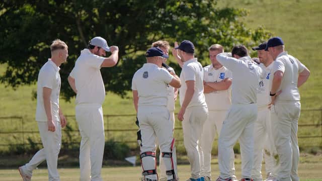 Scalby CC celebrate taking a Cayton wicket