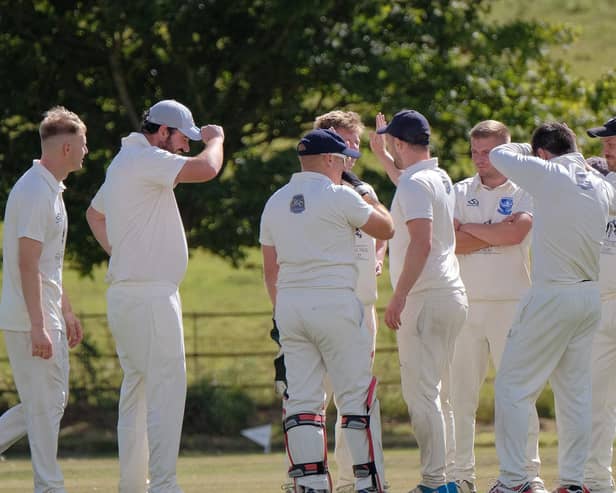 Scalby CC celebrate taking a Cayton wicket