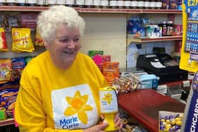 Gillian Bennett, Marie Curie Collection Tin Coordinator is celebrating raising £25,000 for Marie Curie.