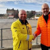Michael Whitely and Scarborough RNLI Coxswain, Lee Marton, who was part of the RNLI crew on the day Michael was rescued. picture: RNLI/Clare Hopps