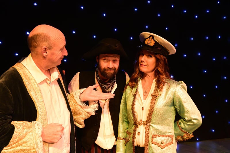 The Squire (Frank O’Neill), Long John Silver (Ivan Hall) and Captain Mullet (Fiona Sellers).