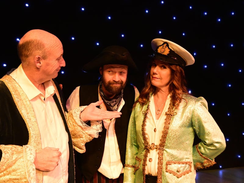 The Squire (Frank O’Neill), Long John Silver (Ivan Hall) and Captain Mullet (Fiona Sellers).