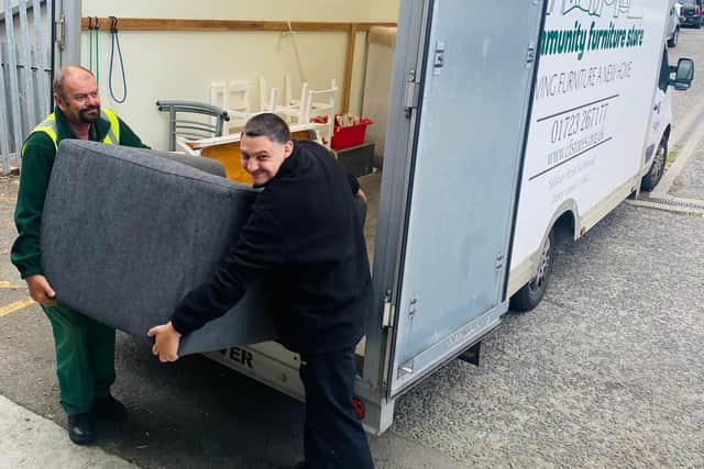 Van Driver Rob (Left) & Volunteer Tom (Right) unloading the Community Furniture Store van,