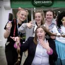Jaymeelee Tolliday, Sophie Davis, Ruby Cooper and Incanto's 'Mirabel' look on as Steph Machin has her hair cut shorter