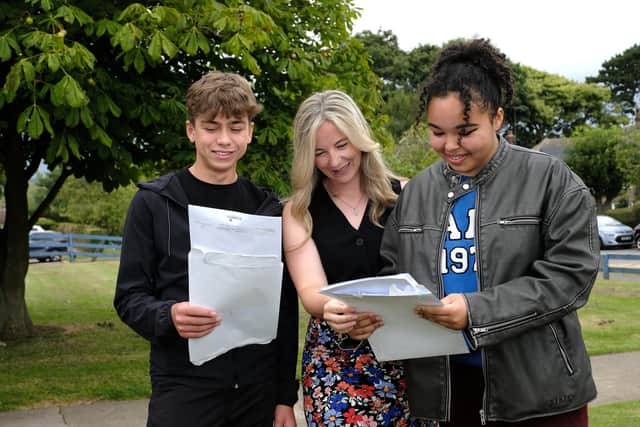 Head Aishling Robinson with Milan and Jasmine, celebrating results day. Photo: Richard Ponter