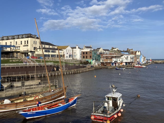 Blue skies framed the idyllic Bridlington seafront while spring sun sparkled in the water.