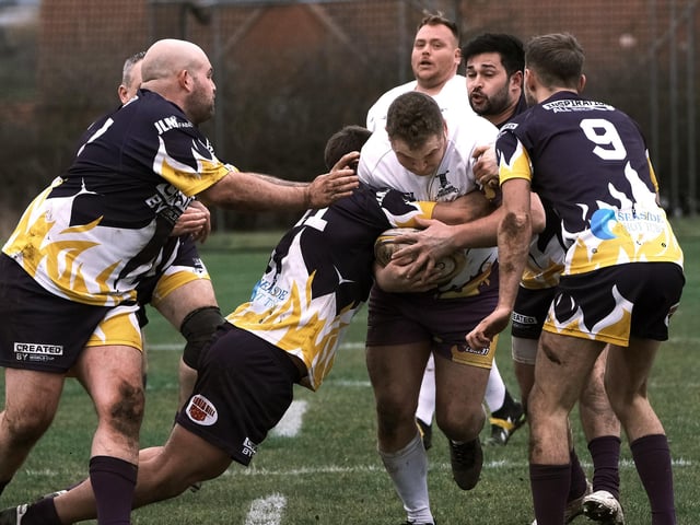 The Pirates try to force through the wall of Old Boys