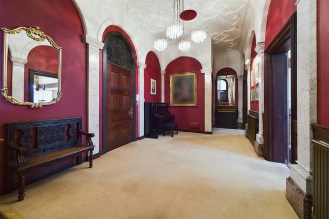 Arched doorways and decor feature strongly within the apartment.