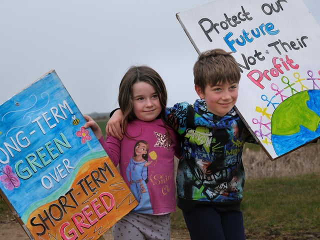 Children with their signs at the march on March 22. picture: Richard Ponter