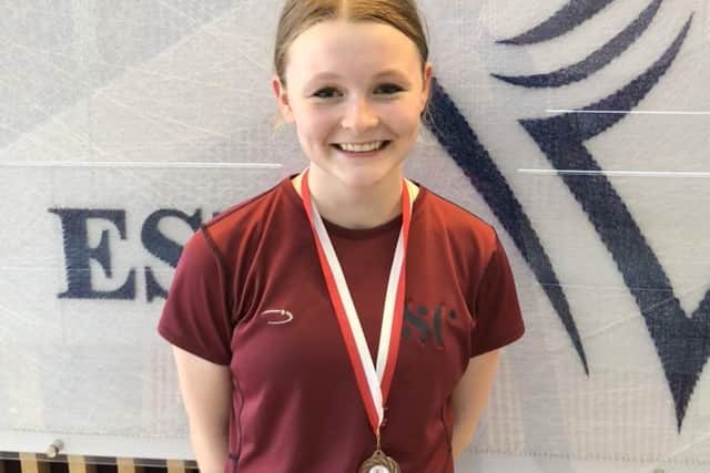 Bridlington squash star Hattie Langley shows off her National Schools medal.
