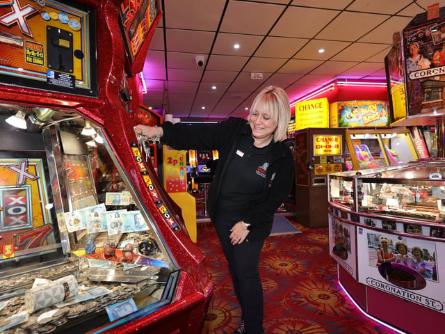 Rachel checking the machines at Silver Dollar