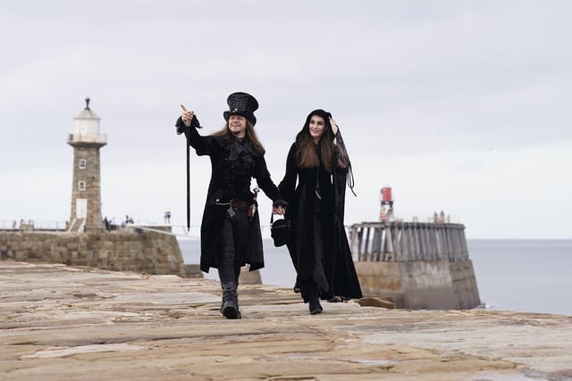 People attend the Whitby Goth Weekend in Whitby, Yorkshire, as hundreds of goths descend on the seaside town where Bram Stoker found inspiration for 'Dracula' after staying in the town in 1890. Picture date: Sunday October 30, 2022.
