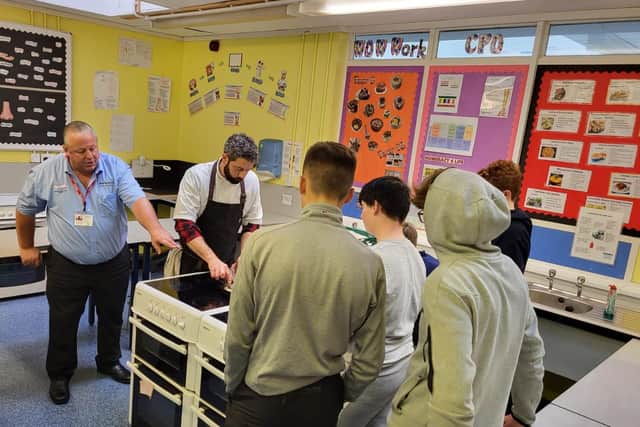 Bridlington school welcomed industry specialists to teach students about preparing and cooking fish.