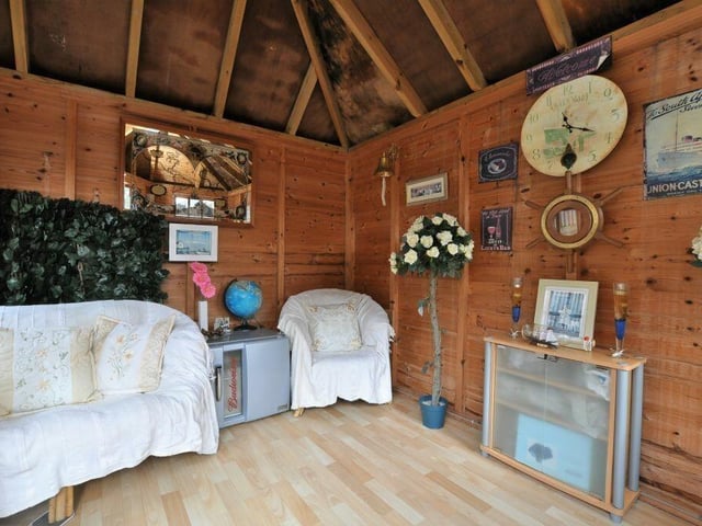 Inside the summerhouse that is a sun trap in the summer.