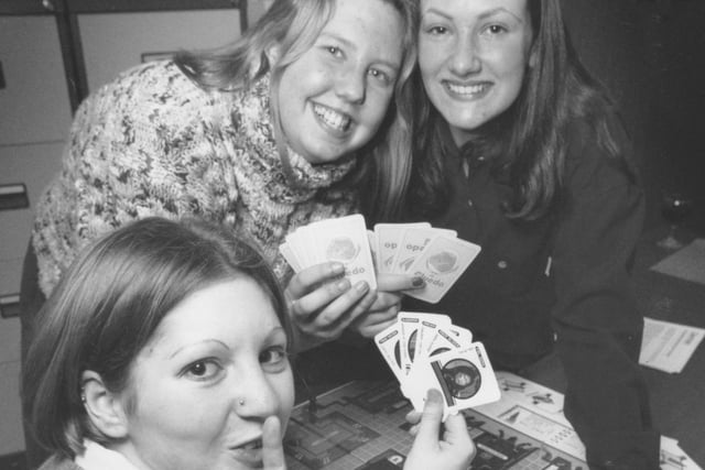Demonstrating their language skills by playing Cluedo in German at the Sixth Form College open evneing back in January 1996 are students, from left, Jennie Horton, MIchelle Temple, and Laura Tilley. 