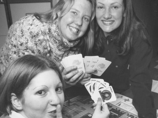 Demonstrating their language skills by playing Cluedo in German at the Sixth Form College open evneing back in January 1996 are students, from left, Jennie Horton, MIchelle Temple, and Laura Tilley. 