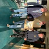 Whitby Lions Bob Stevens, Bob Bennett and Chris Roe with the new defibrillator at The Green Lane Centre, Whitby.