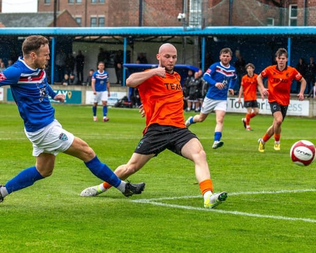 Mitch Curry scores the crucial goal as Whitby Town confirmed their NPL Premier Division status with a 1-0 home win against Blyth. Photo by Brian Murfield