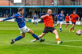 Mitch Curry scores the crucial goal as Whitby Town confirmed their NPL Premier Division status with a 1-0 home win against Blyth. Photo by Brian Murfield