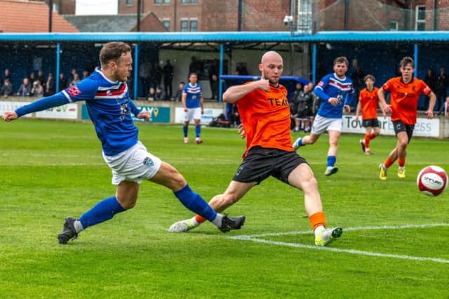 Mitch Curry scores the crucial goal as Whitby Town confirmed their NPL Premier Division status with a 1-0 home win against Blyth. Photo by Brian Murfield