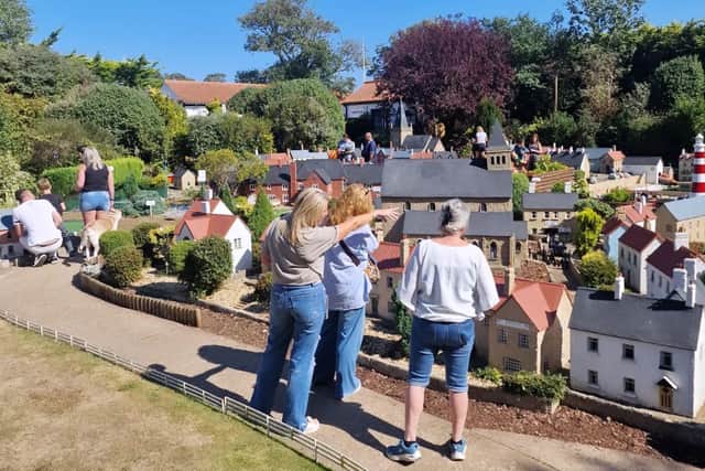 Rachel Hill shows Kathryn Carmichael and Jan Birley Bondville Model Village