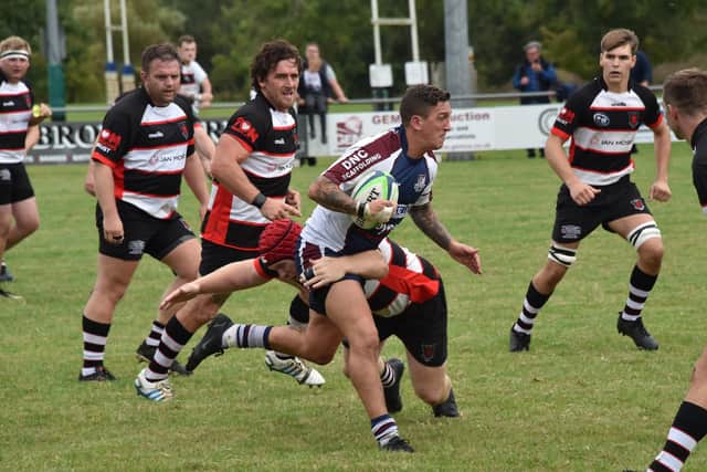 Scarborough RUFC's Tom Makin is tackled close to the Malton line   PHOTO BY PAUL TAIT
