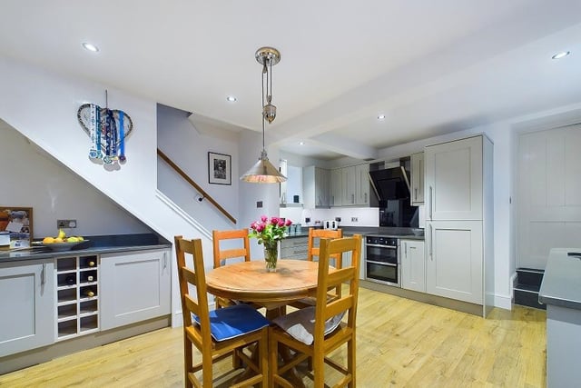 The dining kitchen has fitted units and appliances.