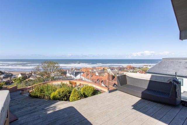 The summer house terrace has exceptional views.