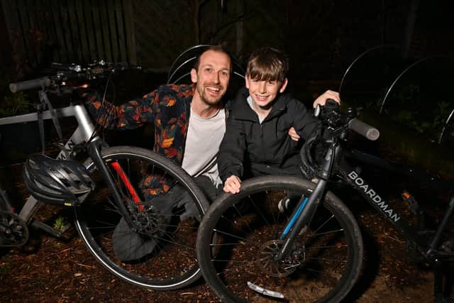 Casper Hunter gets ready for his charity cycle ride with Dad Jack. Photo: Richard Ponter