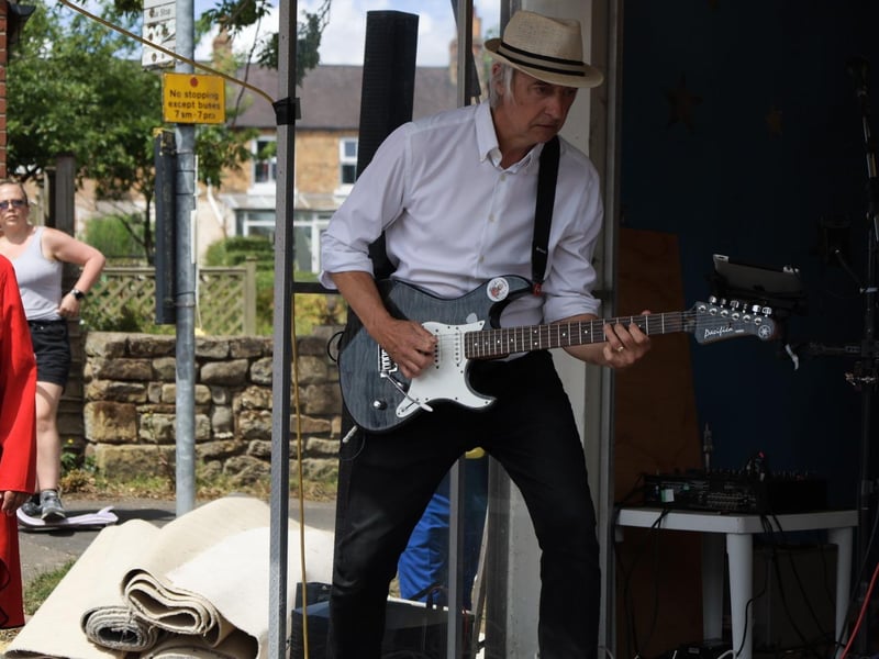 Guitarist on stage at the fair. photo: Abbygail Harden