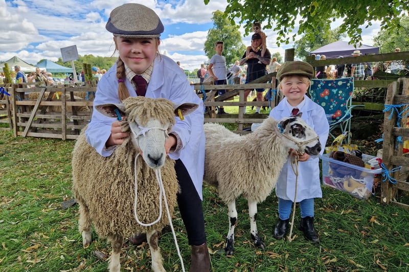 Daisy Lazenby, 10, and Polly Lazenby, 3, from the Howe Hills Flock with their Leicester Longwool sheep