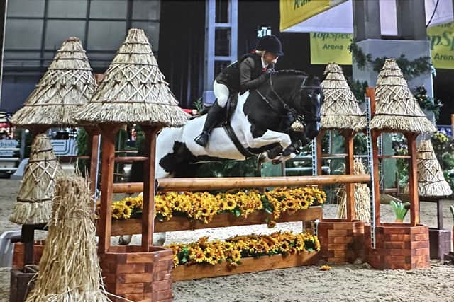 Bridlington youngster Fliss Watts and Precious Gem on their way to winning at the HOYS. Photo by 1st Class Images
