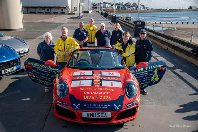 Bridlington RNLI volunteers and 'Splash' the Porsche 911. - Image: RNLI/Mike Milner