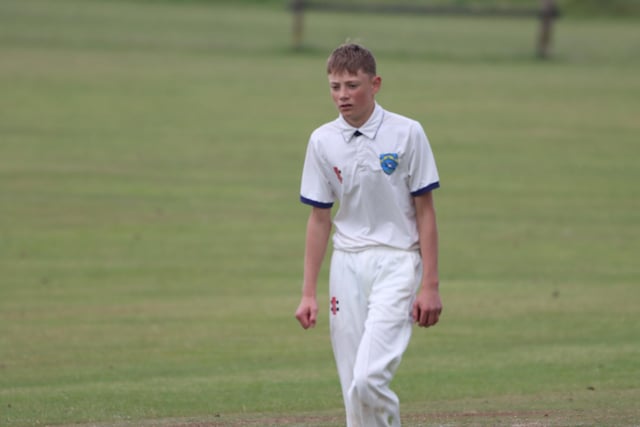 A young Sewerby player is pictured as his side bowled to Ebberston 2nds.