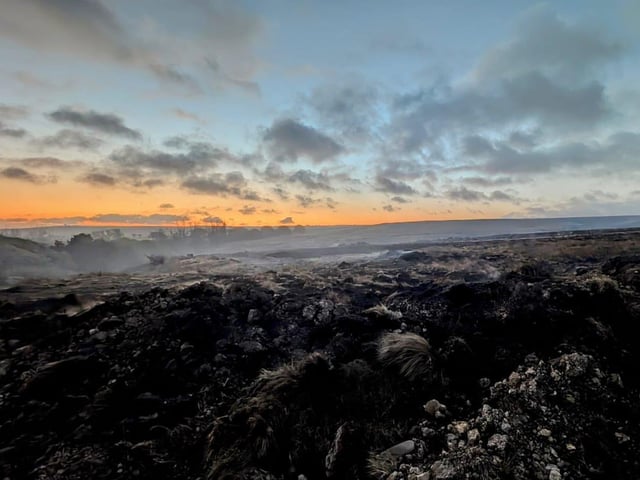Sections of scorched earth shows what the aftermath of the fire may look like.