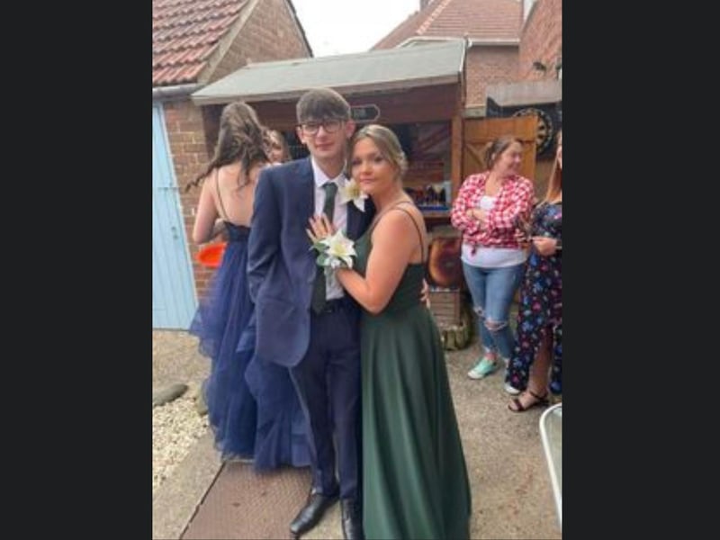 This couple are looking stunning with their matching corsages.