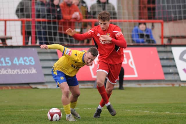 December's Brid Town player of the month Alex Markham in action against the league leaders.